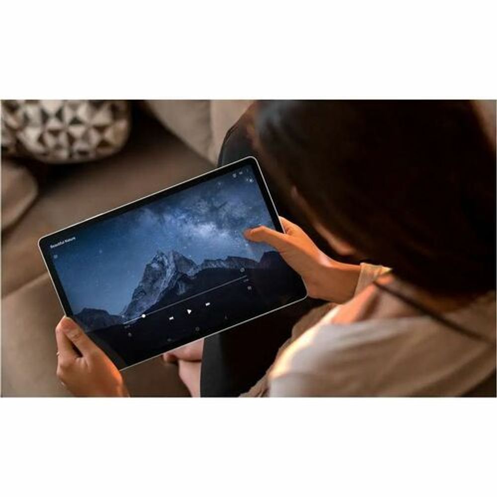 Samsung rugged tablet in hands showing blue landscape screen