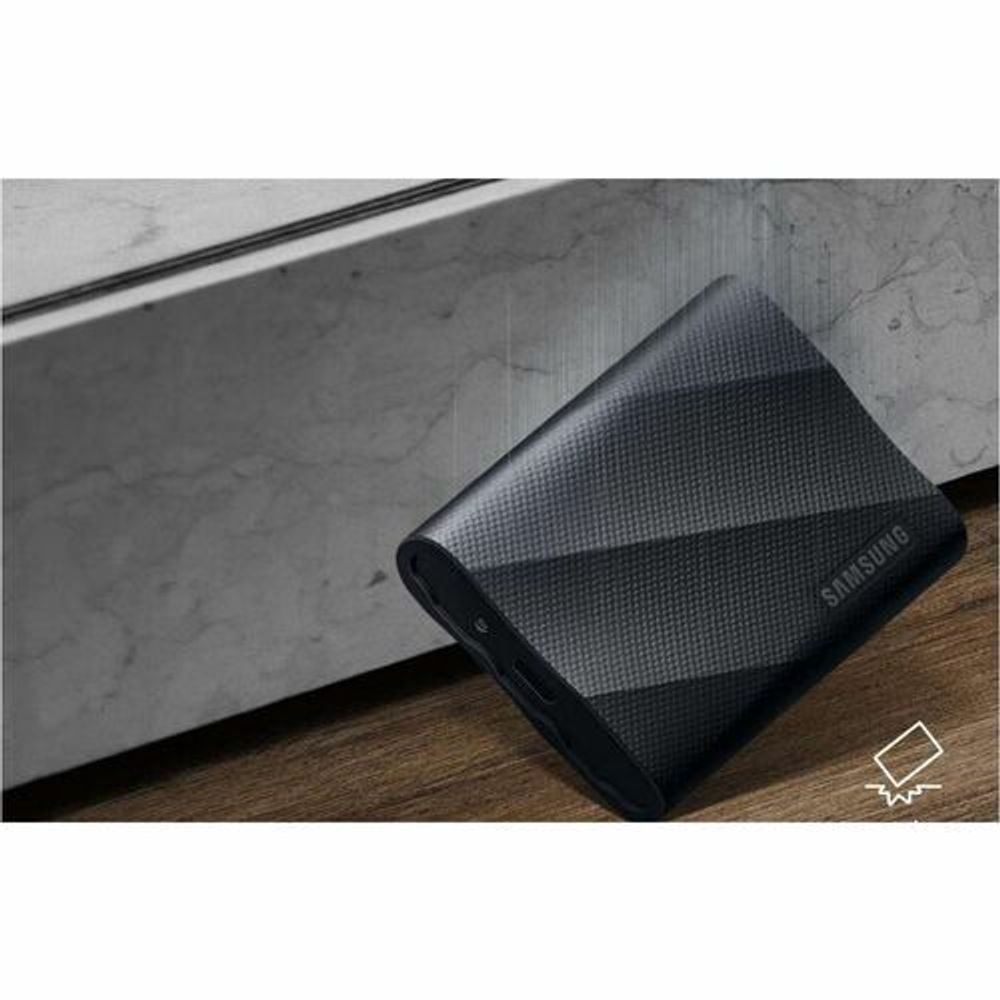 Black portable SSD with textured casing and Samsung logo on the side.