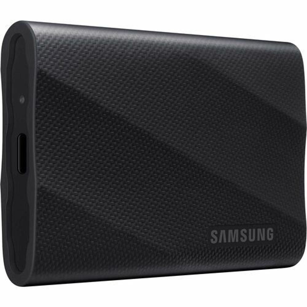 Black portable SSD end view with textured case, port openings, and Samsung logo.