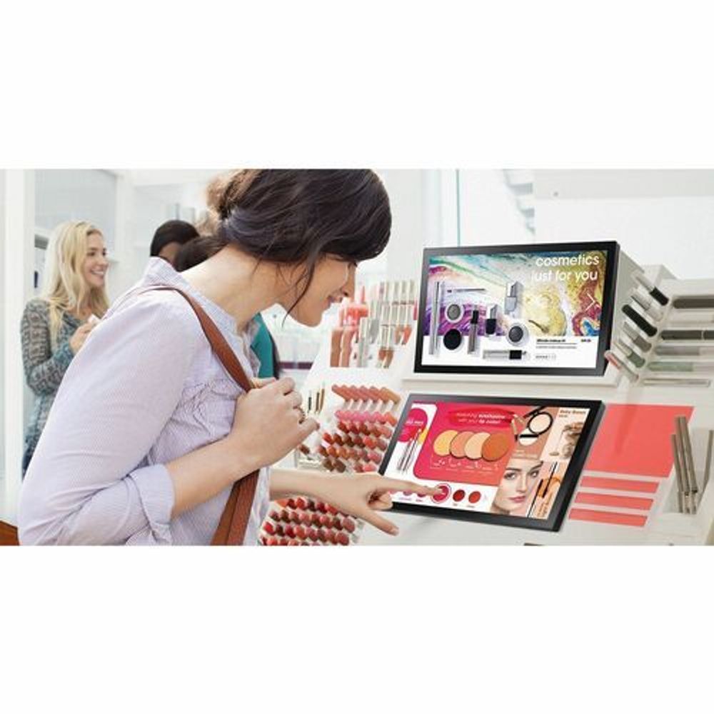 13-inch LCD digital signage display at a cosmetics counter with product graphics