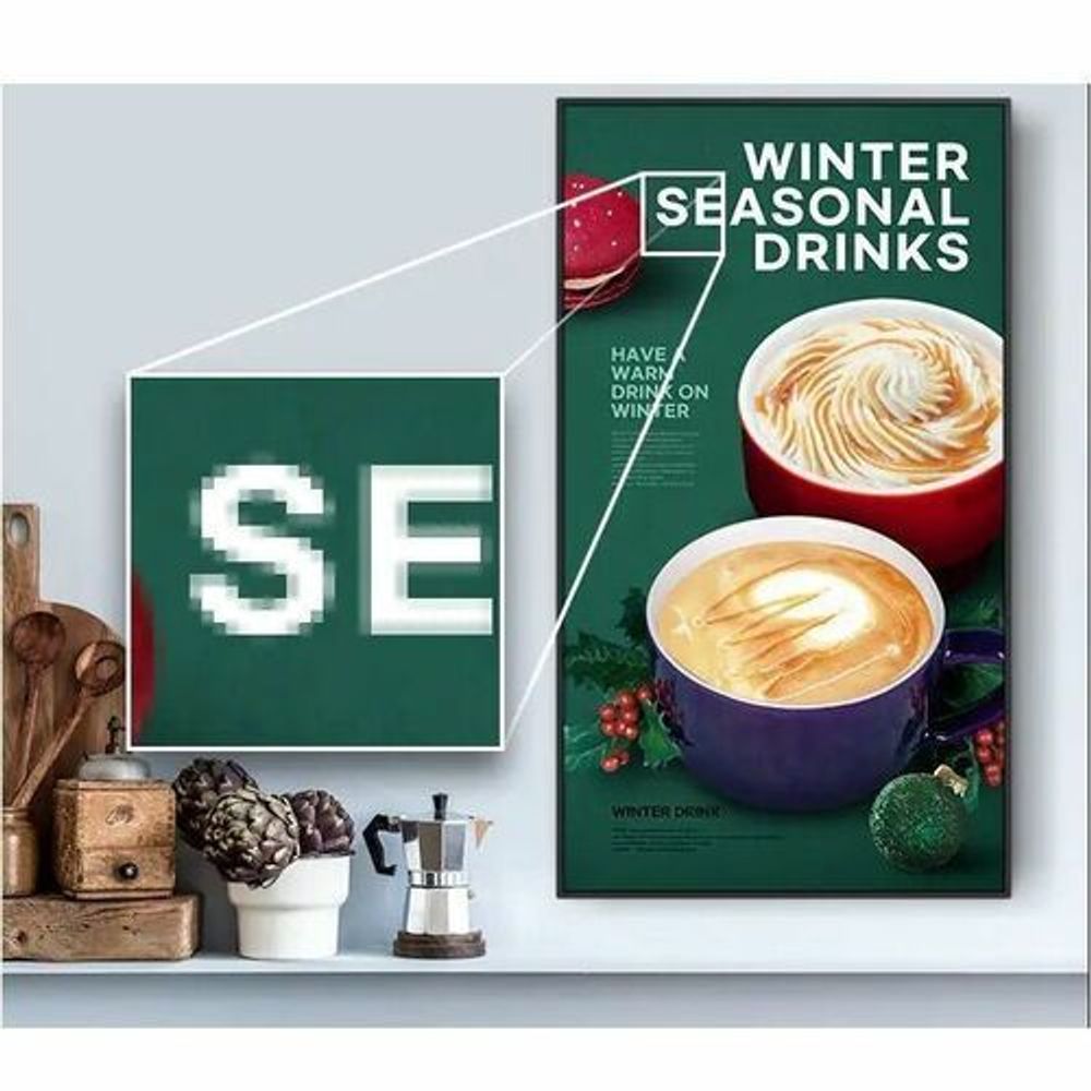 Digital signage display on wall showing winter seasonal drinks ad with latte cups.