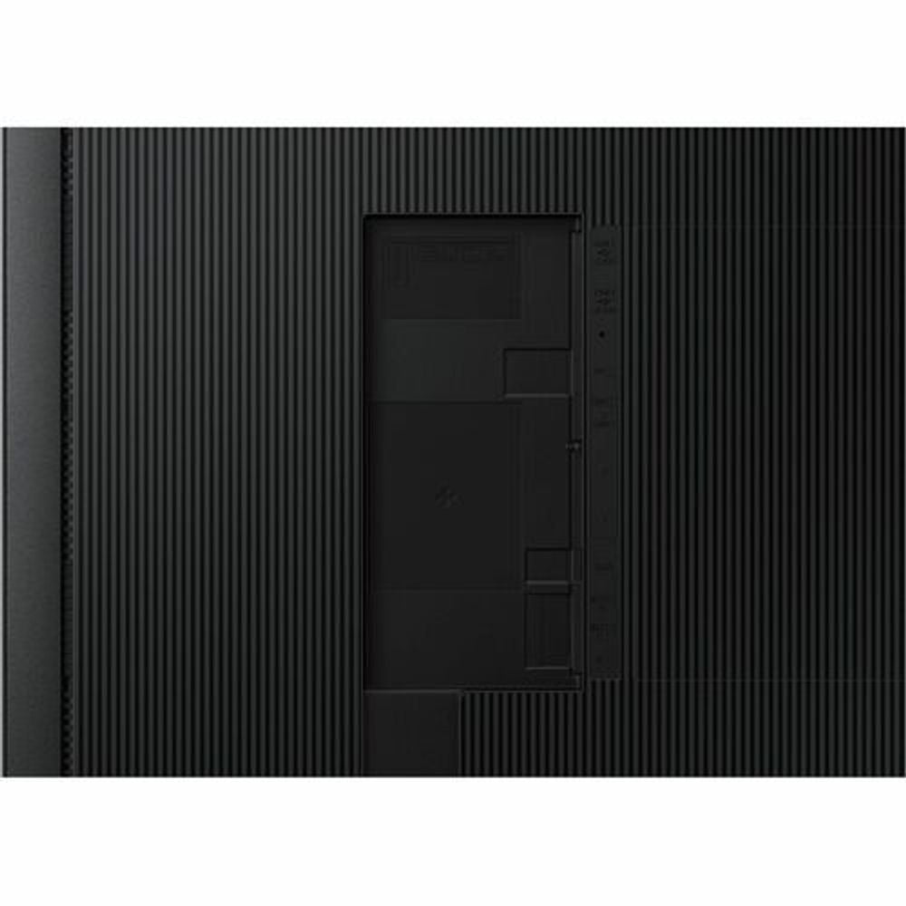 Digital signage display back close-up showing port panel and dark textured surface.