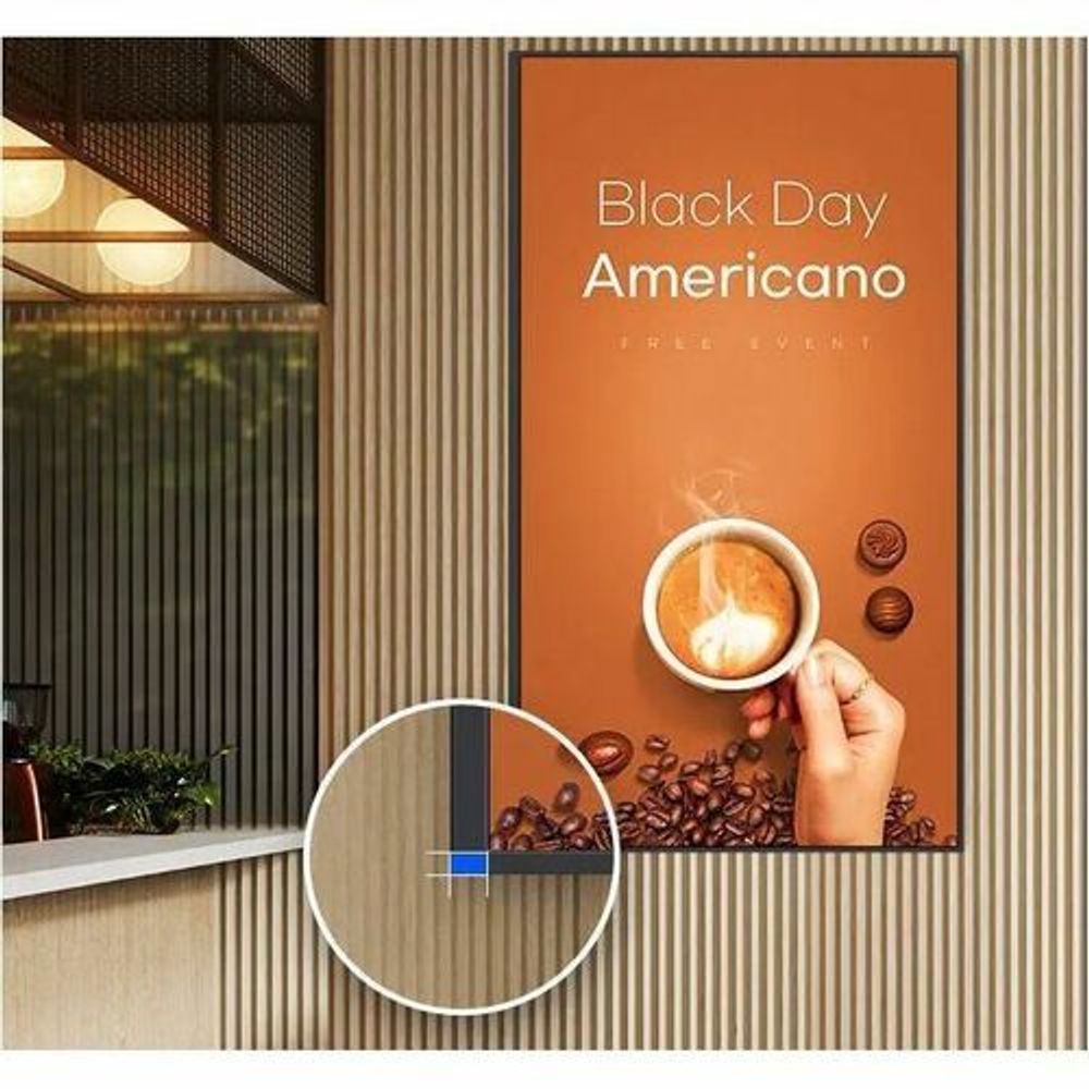 Digital signage display showing a beverage promotional ad on screen