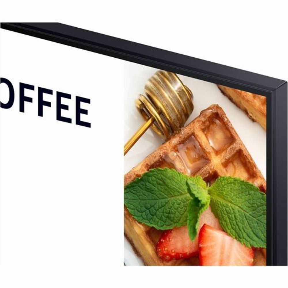 Digital signage display with dark bezel showing a close-up waffle and mint leaves screen.