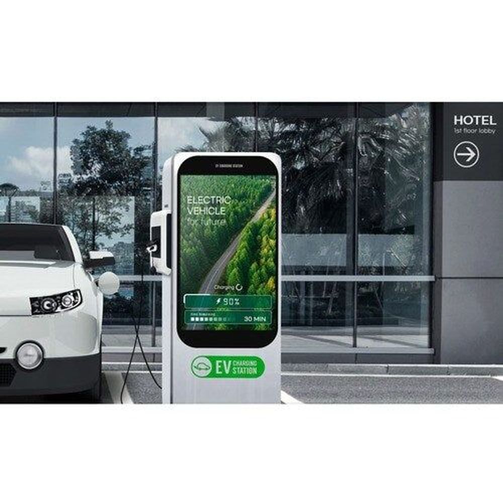 55-inch vertical LCD digital signage display on pedestal stand, showing EV charging screen