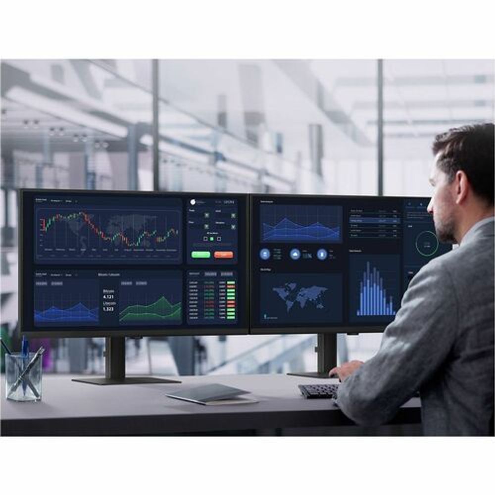 32-inch ViewFinity S6 QHD monitor in a modern office setup with dashboards