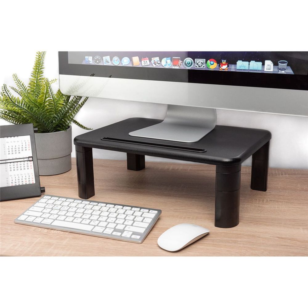 Black monitor riser on desk with wide top and three supporting legs