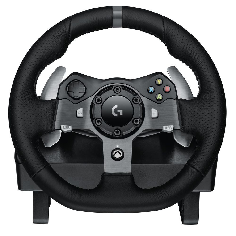 Black racing wheel showing textured rim and button cluster near the right-hand side