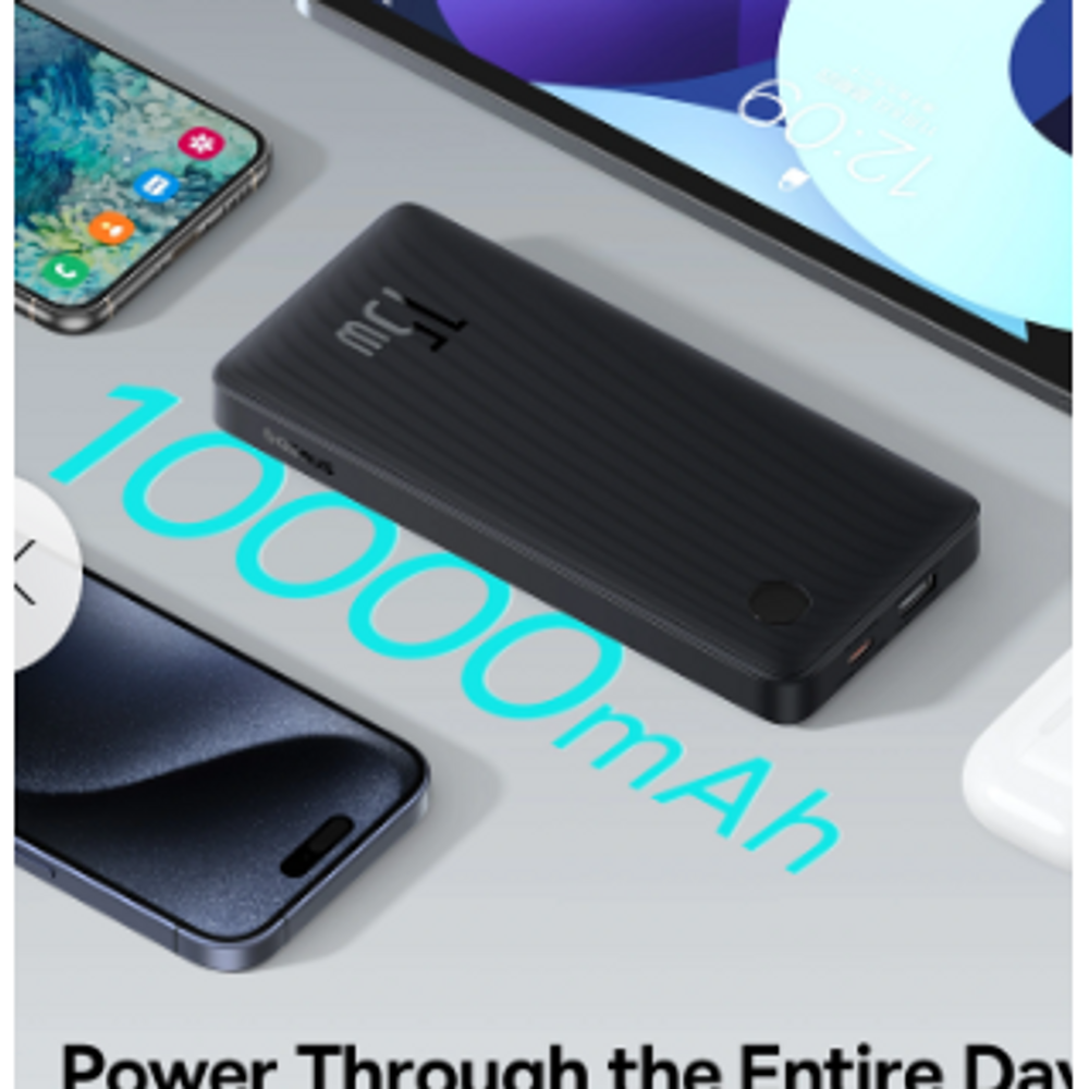 Black power bank lying flat with textured grip and connected charging cable.