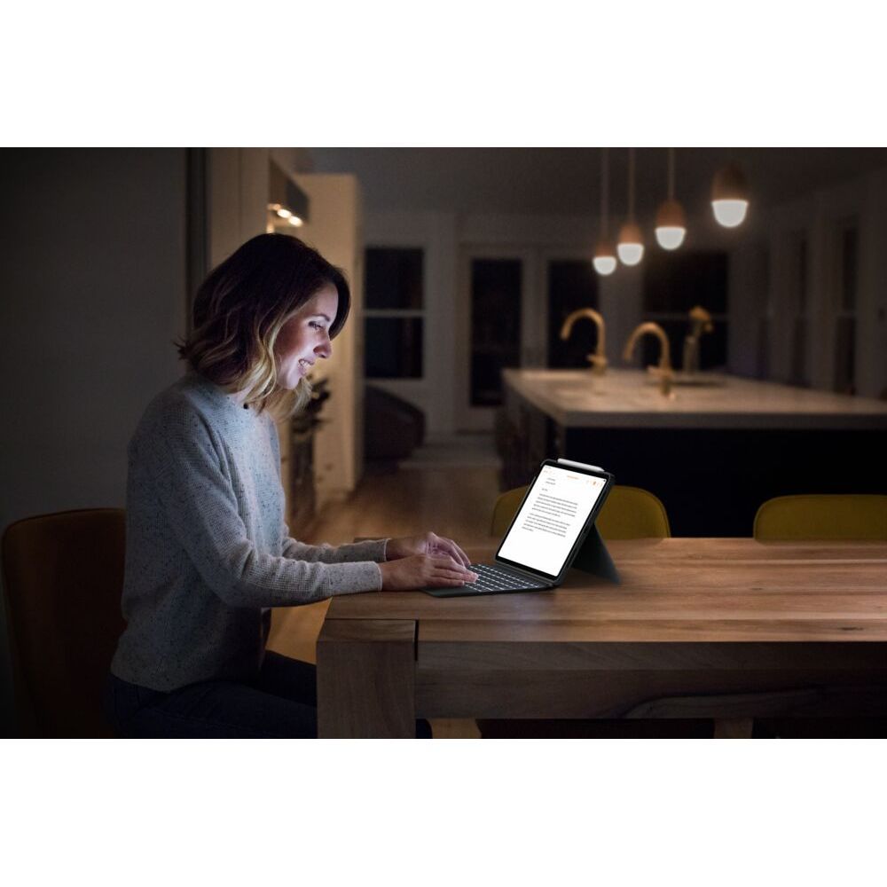 Graphite keyboard case for iPad Air 13-inch on desk, person typing with tablet