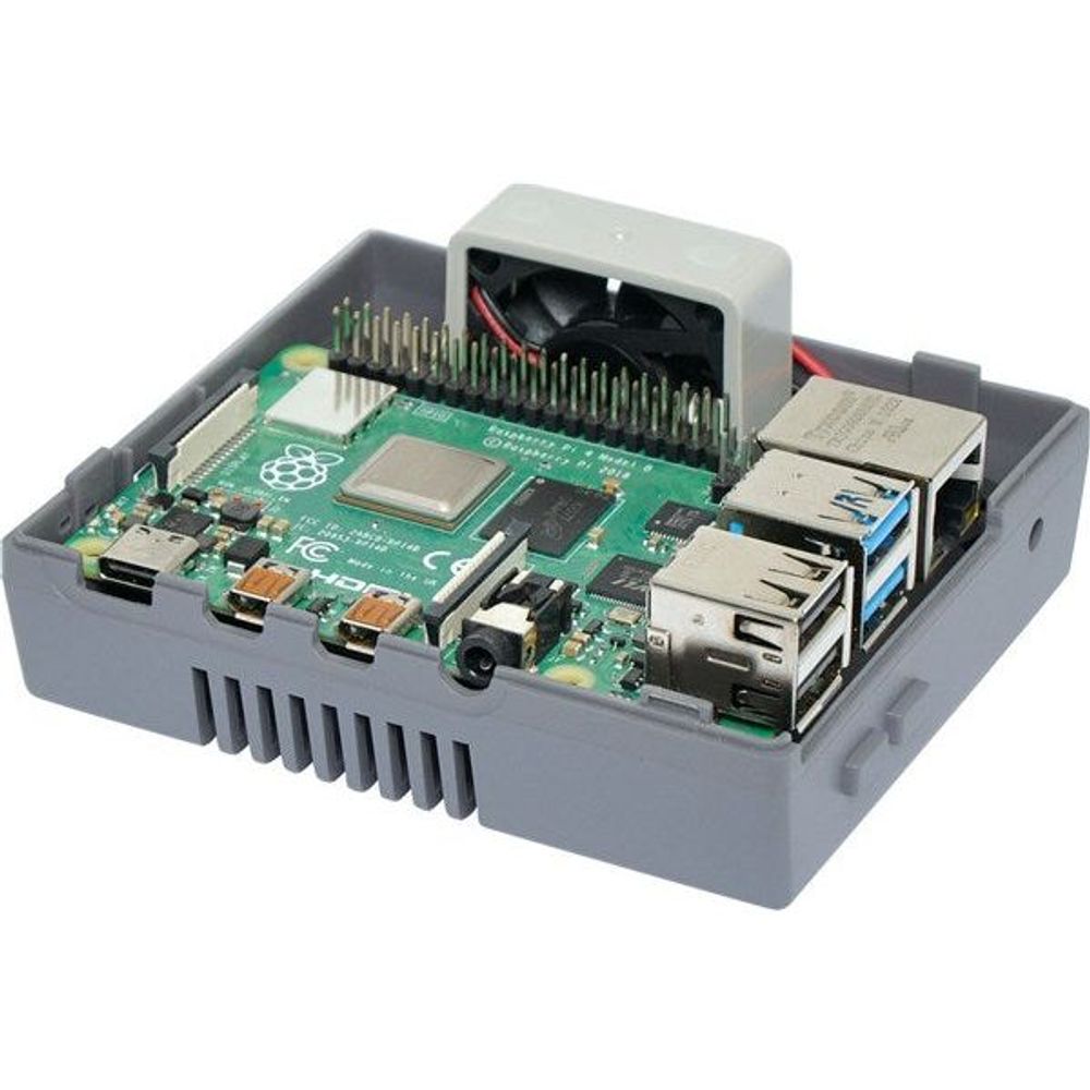 Open light gray gaming case showing Raspberry Pi board, connectors, and ports