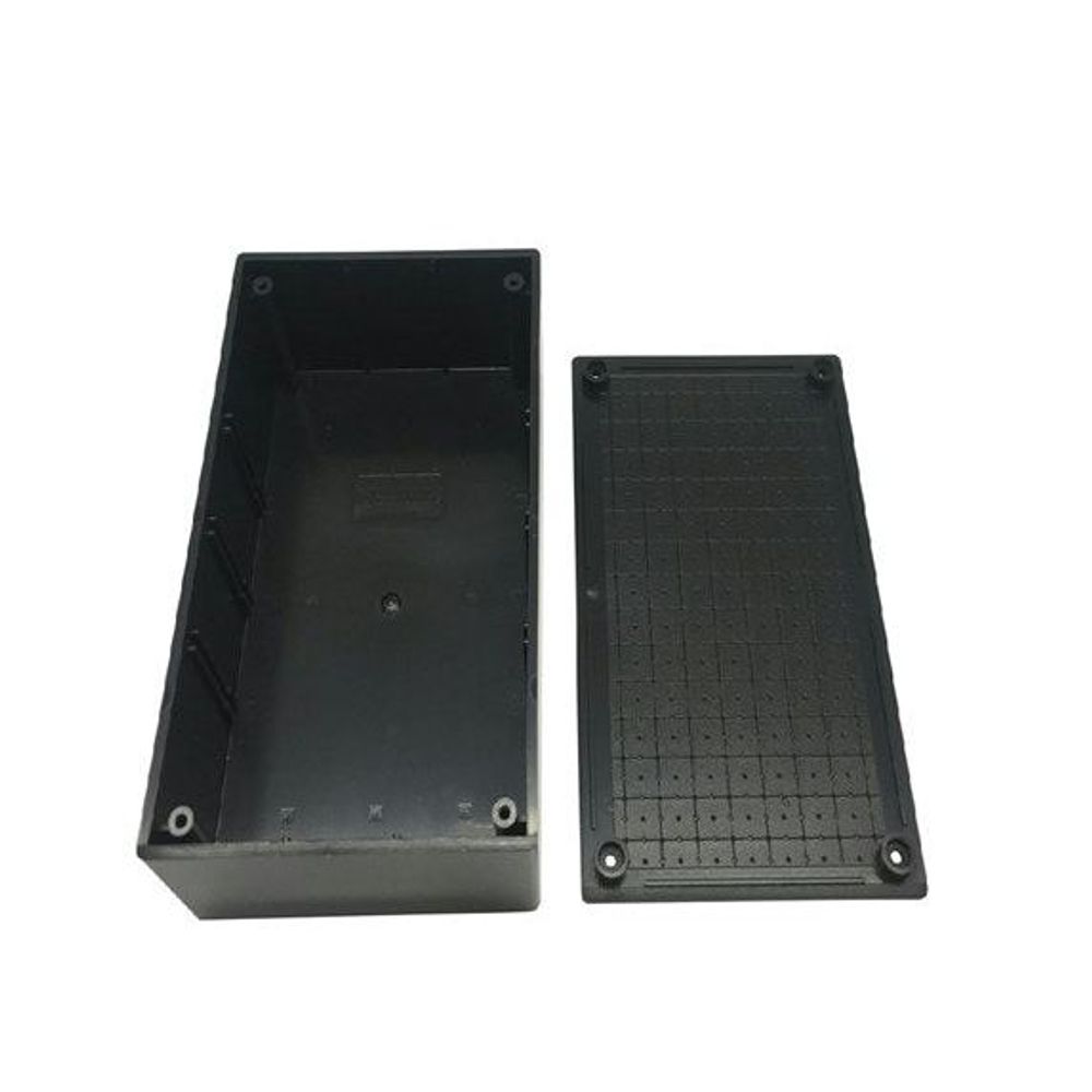Black jiffy box base and lid underside with mounting holes and grid