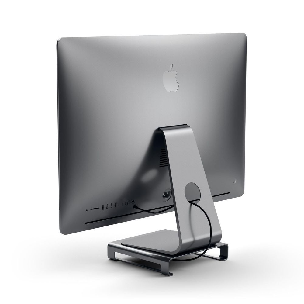 Aluminum monitor stand hub holding iMac from rear view, space gray base