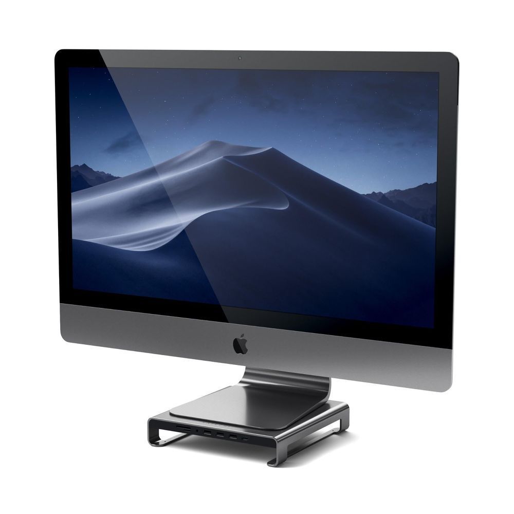 Monitor stand hub with iMac, space gray hub base and front ports visible