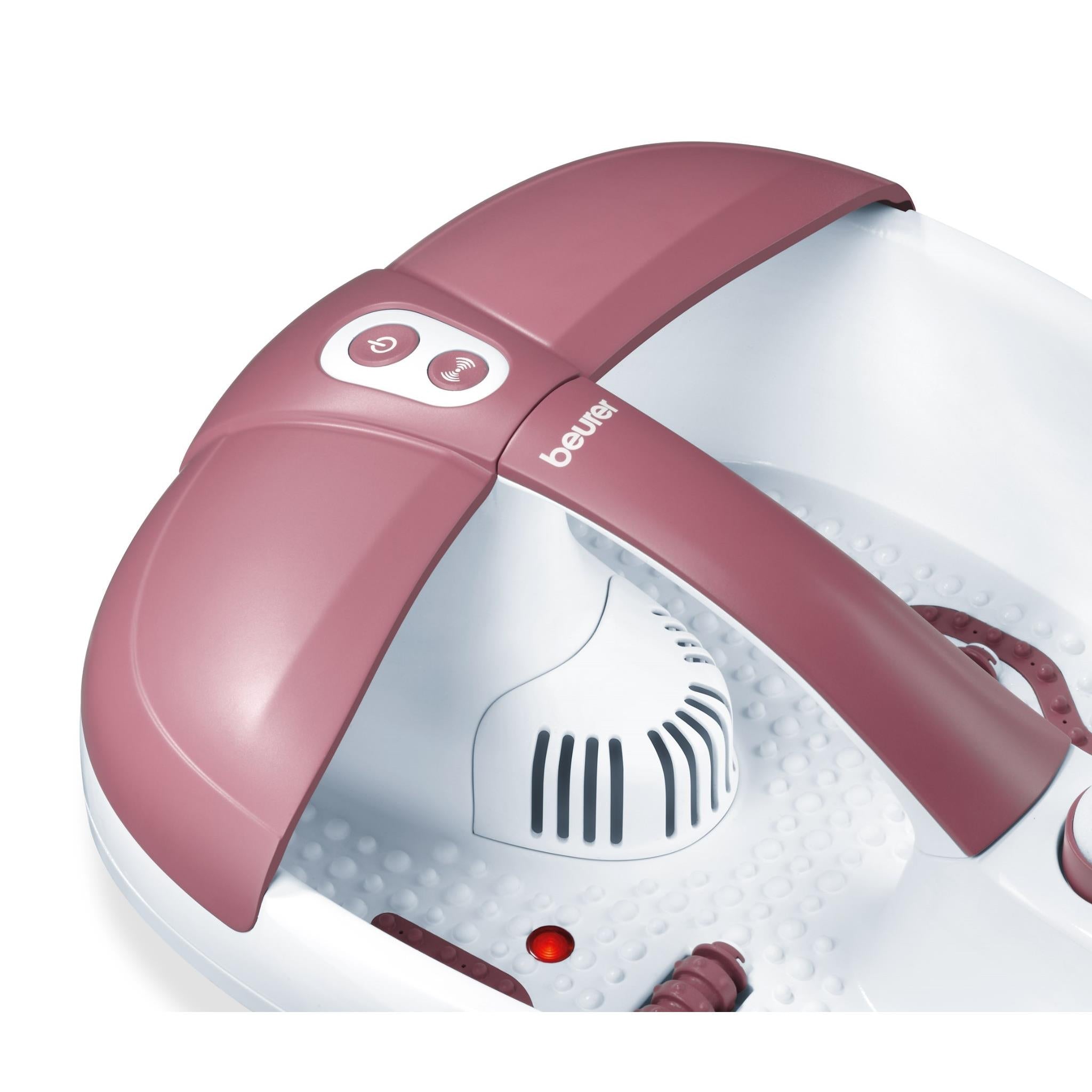 Pink and white foot spa with splash guard and central control buttons