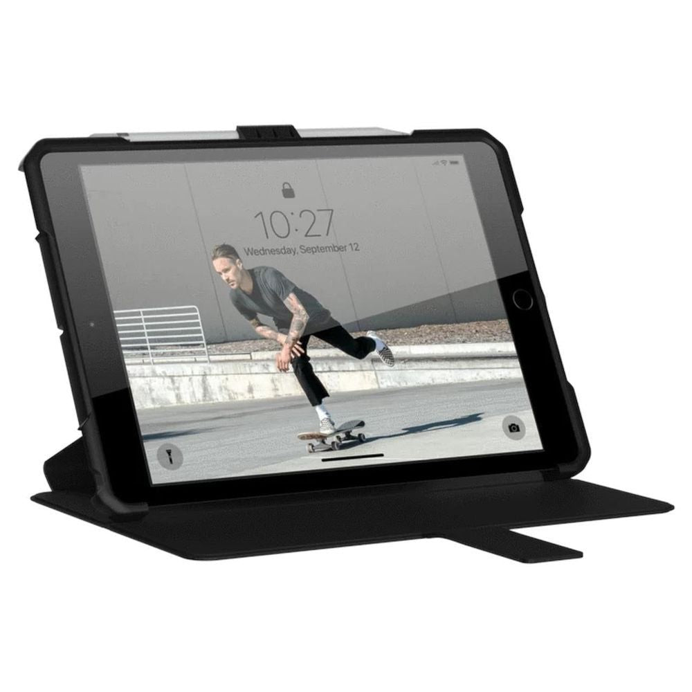 Black UAG Metropolis iPad case with kickstand holding the tablet upright