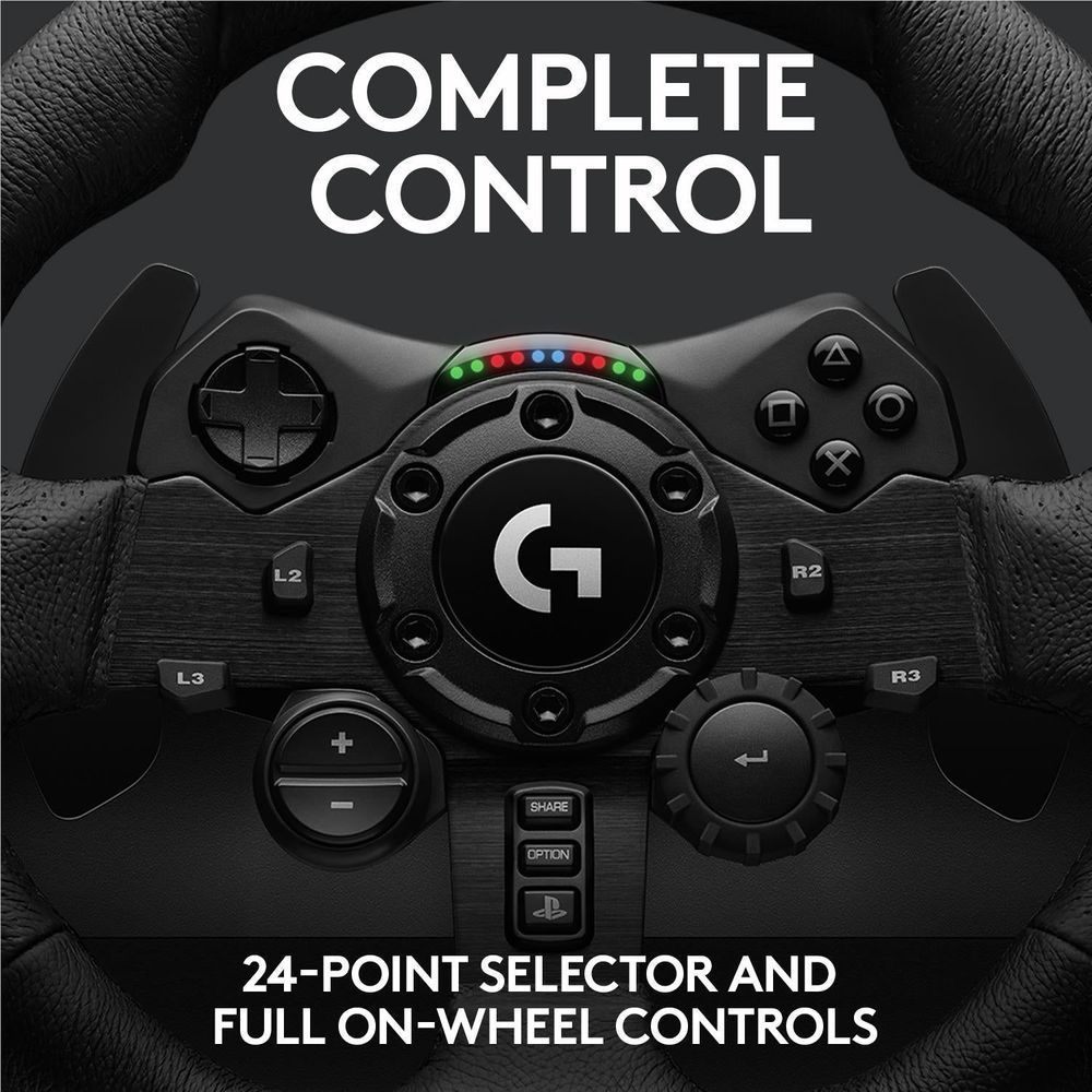 Logitech G923 steering wheel close-up, circular center controls with lit dial and action buttons