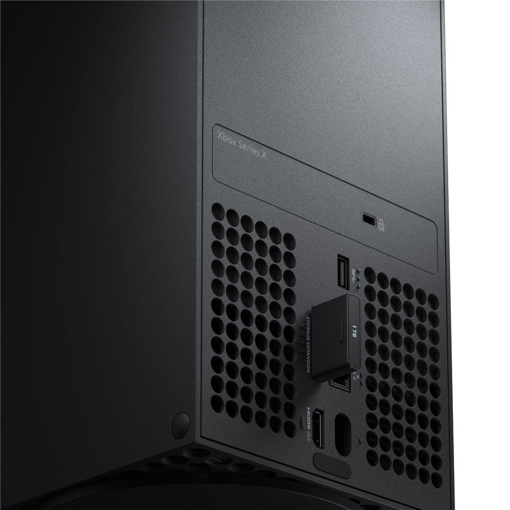 Xbox rear port with Seagate 1TB storage expansion card installed, dark gray