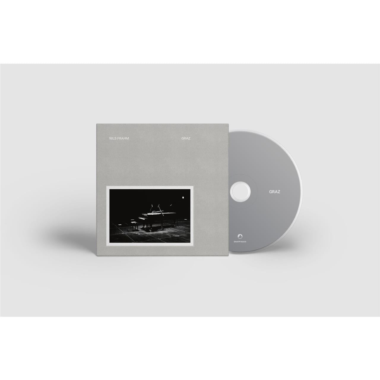 Graz vinyl record with dark gray disc and gray sleeve, artwork photo window