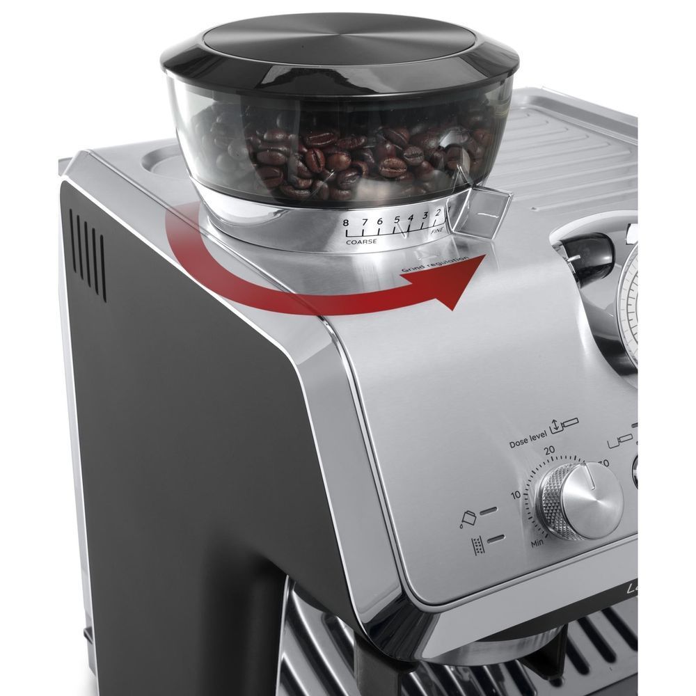 Stainless espresso machine bean hopper with coffee bean contents and control dials