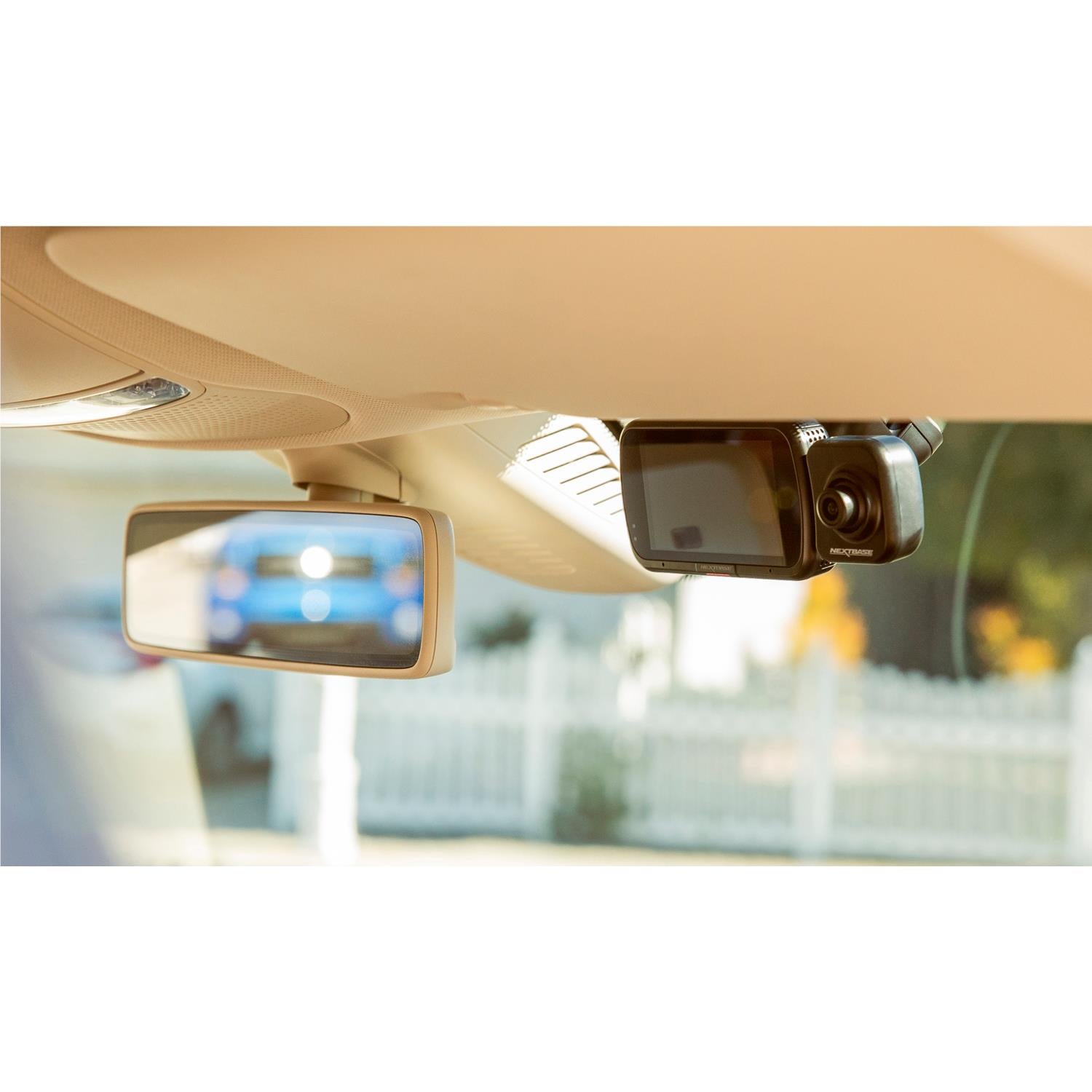 Cabin view interior camera mounted under car dashboard, front dash display visible