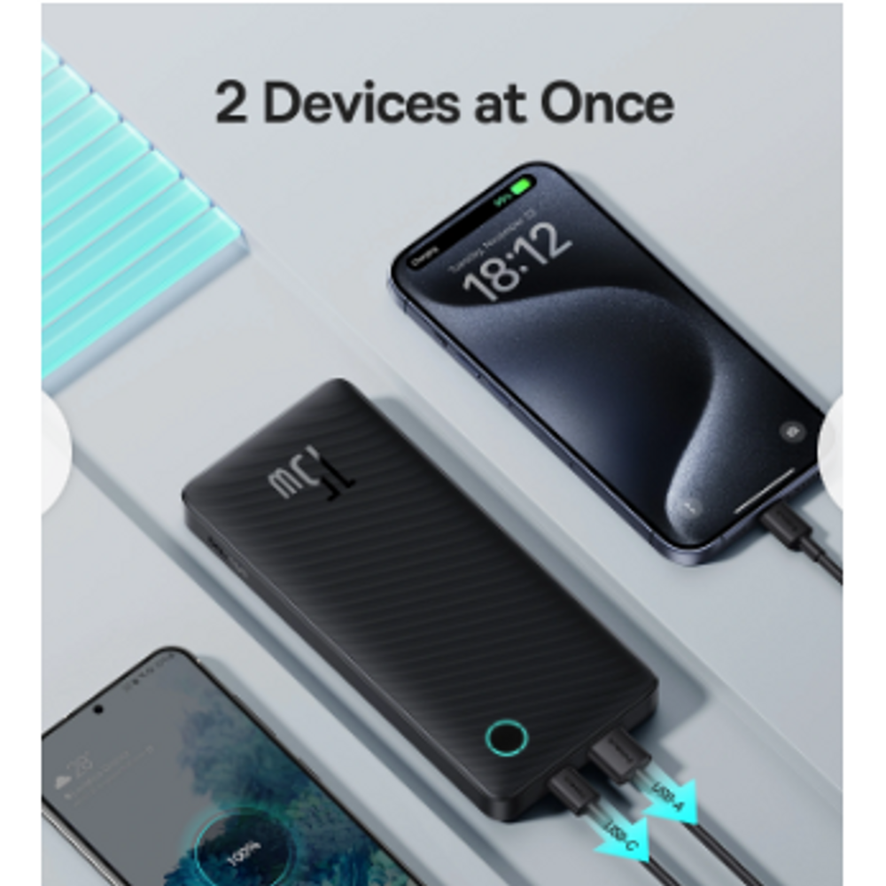Black power bank charging two phones at once, showing LED charging ring.