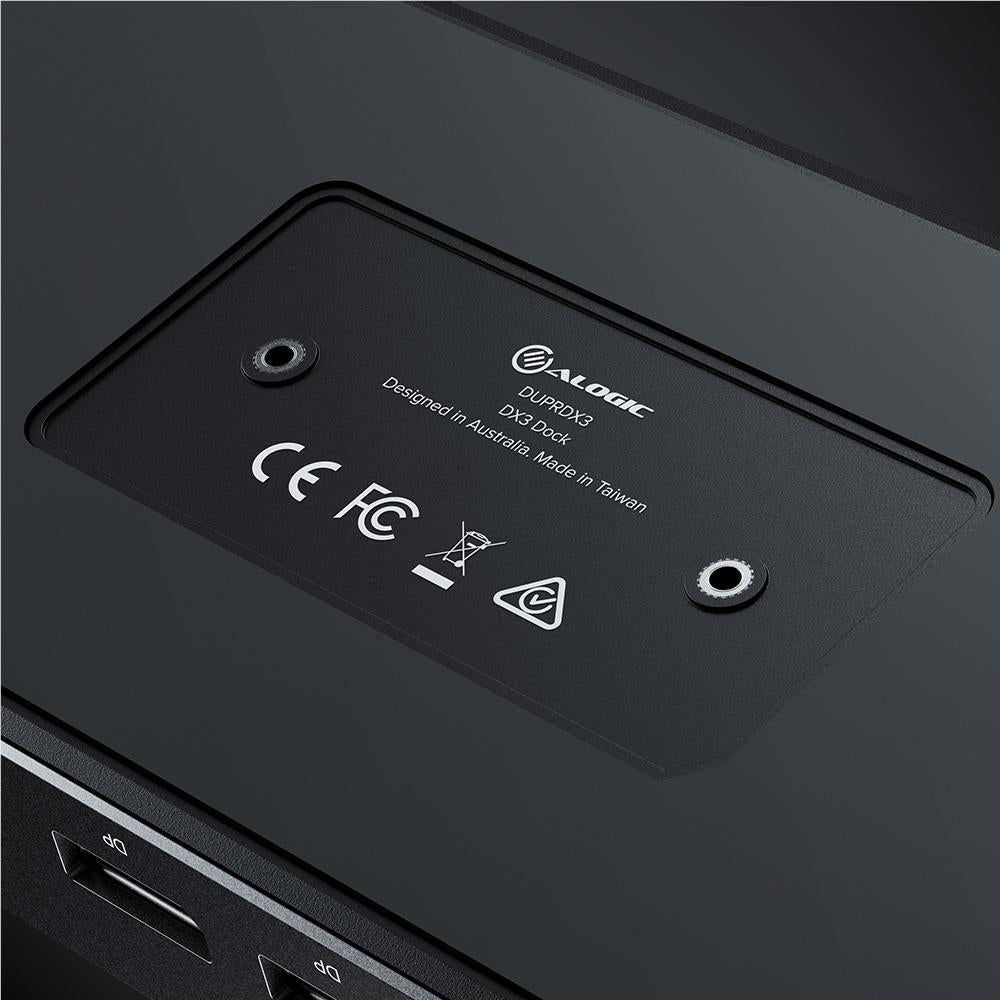 ALOGIC docking station underside with regulatory text and mounting holes