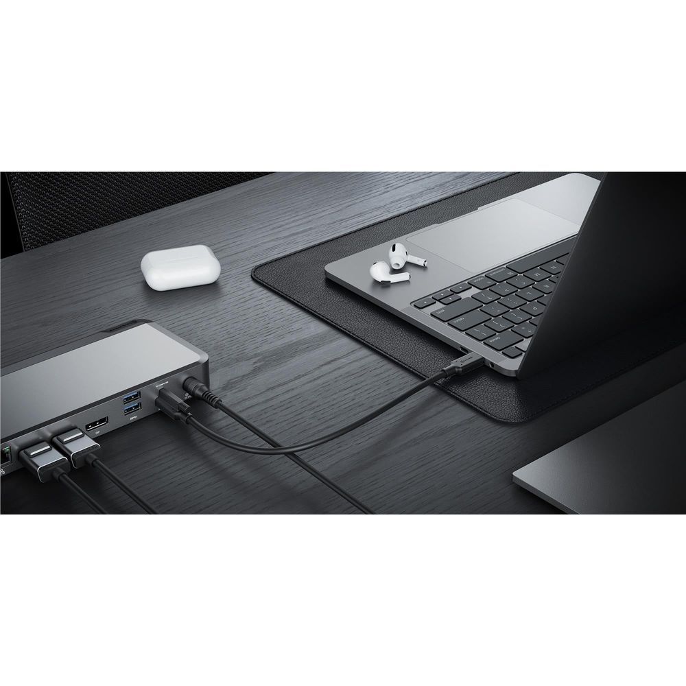 ALOGIC docking station connected to laptop with visible USB and display cables