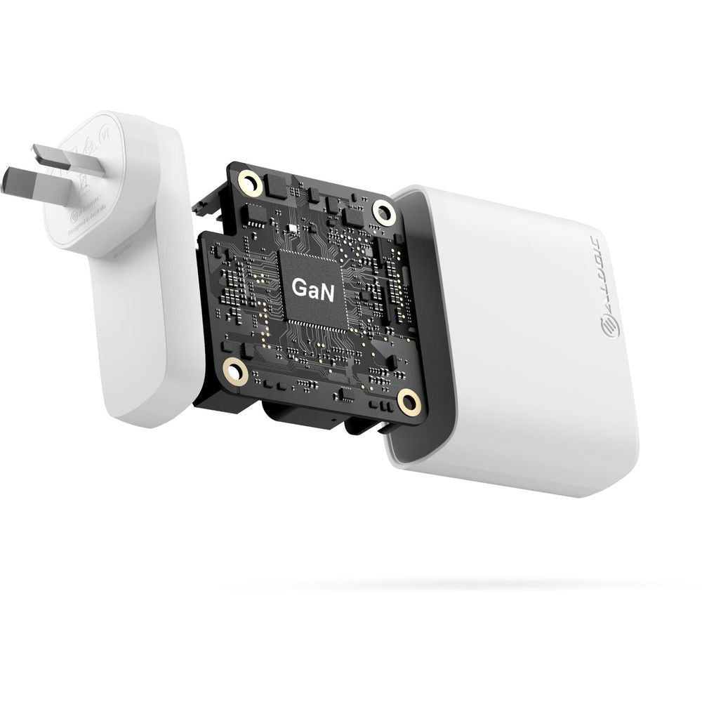 White 100W GaN wall charger with exposed circuit board and ports