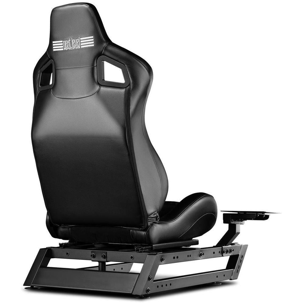 Black racing seat add-on with headrest and armrests, front-left view on base