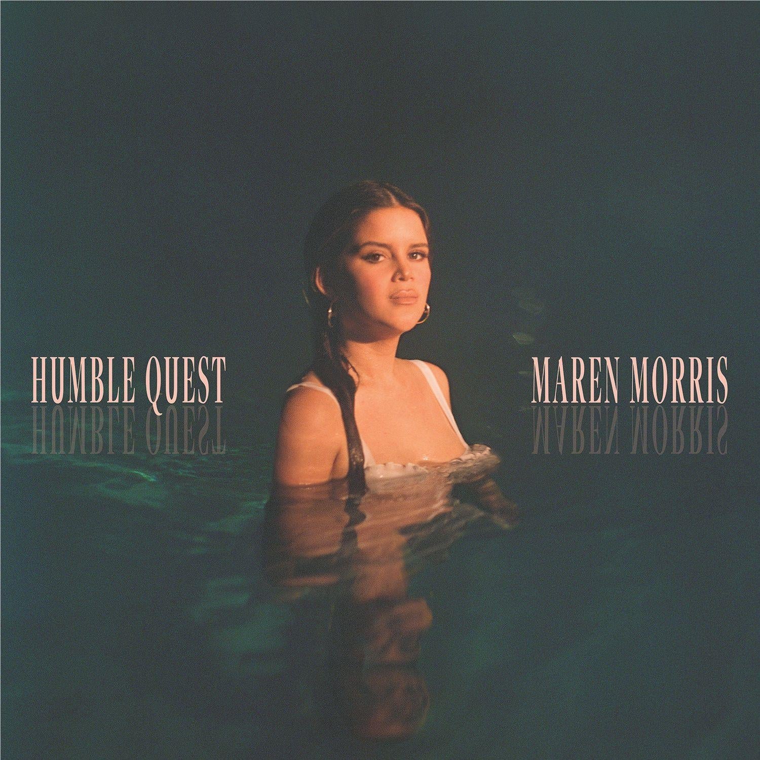 Album cover art featuring a woman in shallow water with a reflective, dark-toned look