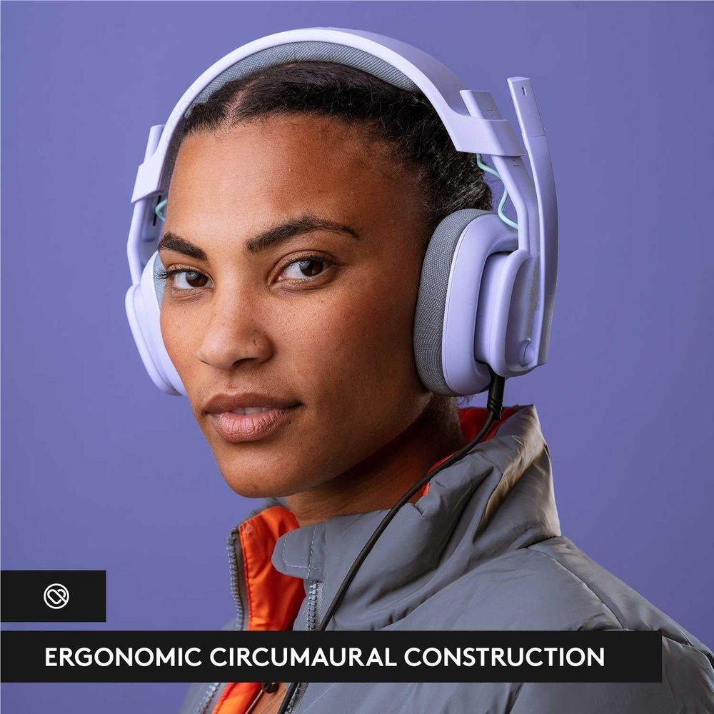 Lilac over-ear gaming headset on a person with gray ear cushions