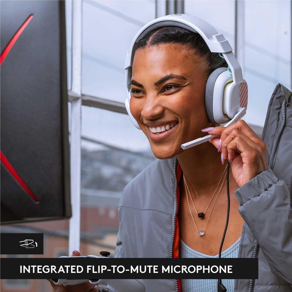 White gaming headset with flip-to-mute microphone boom near the mouth while worn