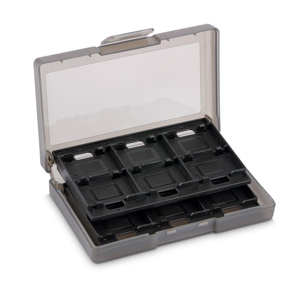 Gray Nintendo Switch Lite game card case, open with empty grid of 24 slots