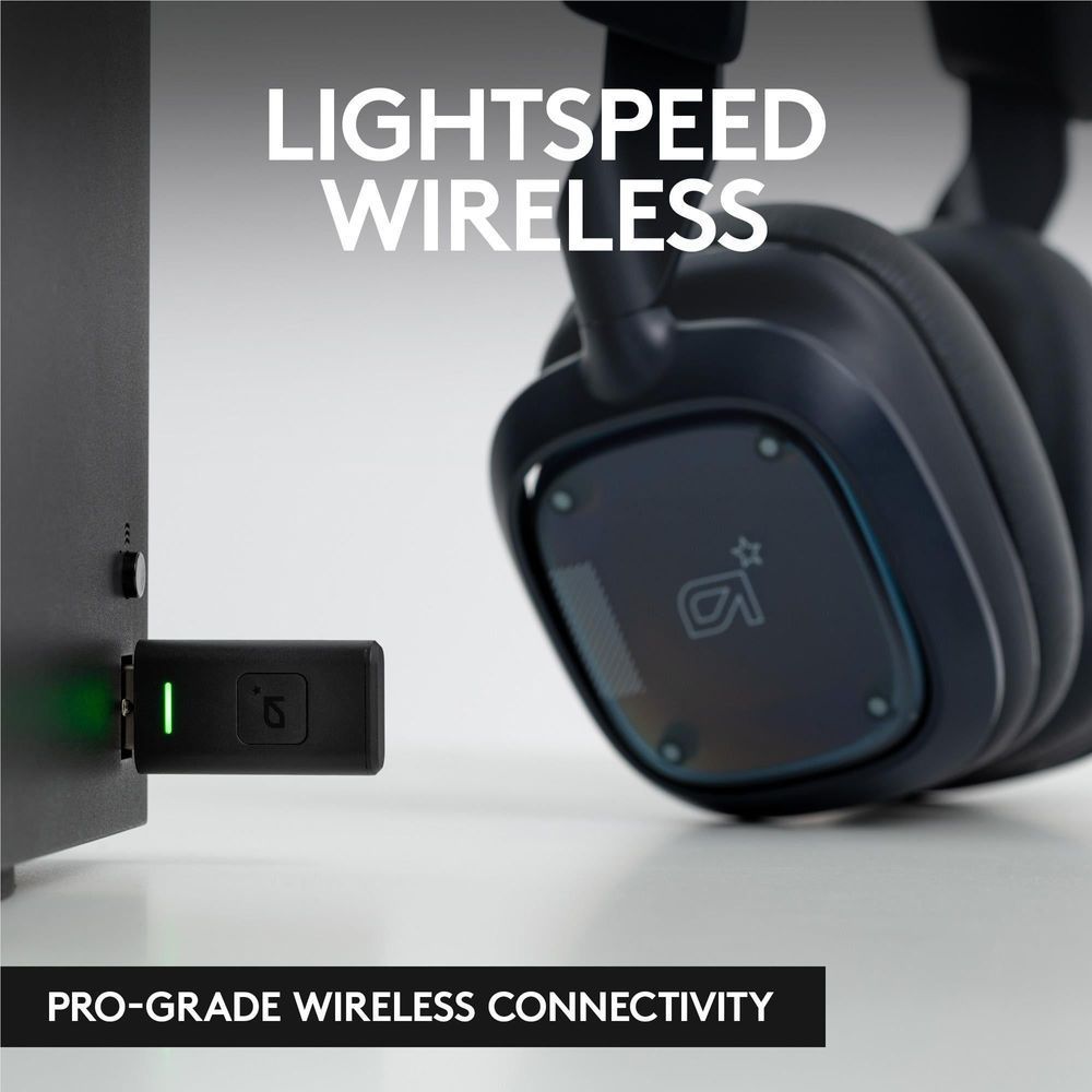Navy over-ear wireless headset with transparent ear module and charging dock