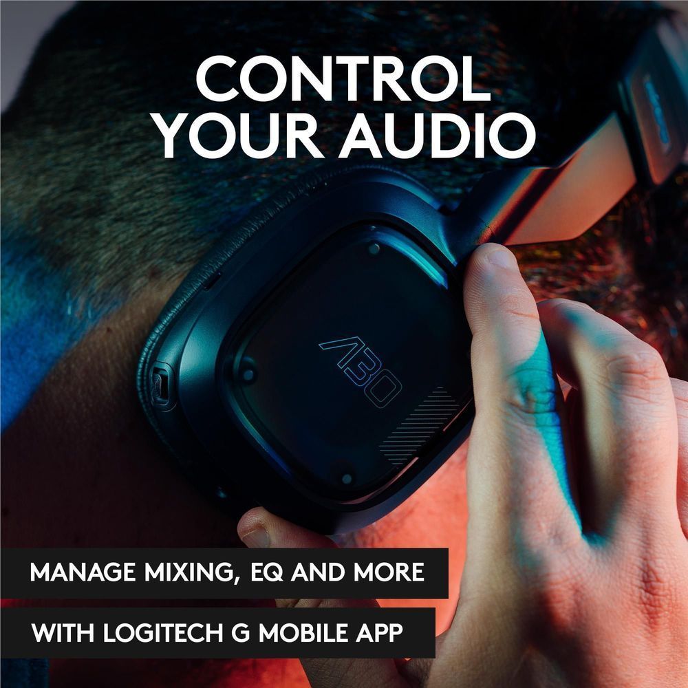 Navy over-ear headset control cup held in hand with glowing logo panel