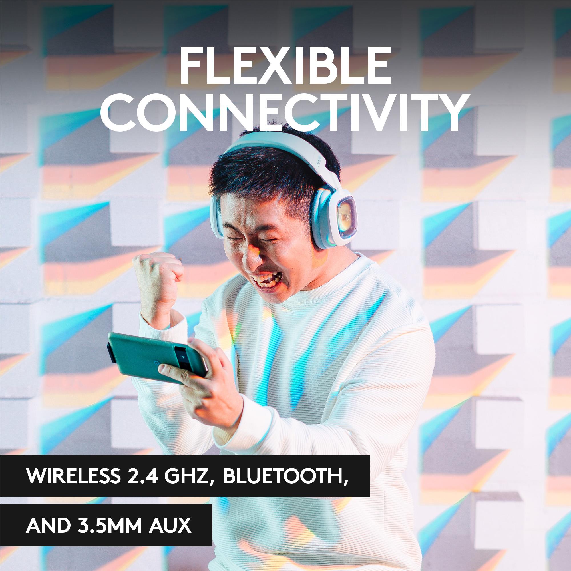 White wireless headset worn over ears with glowing ear cups