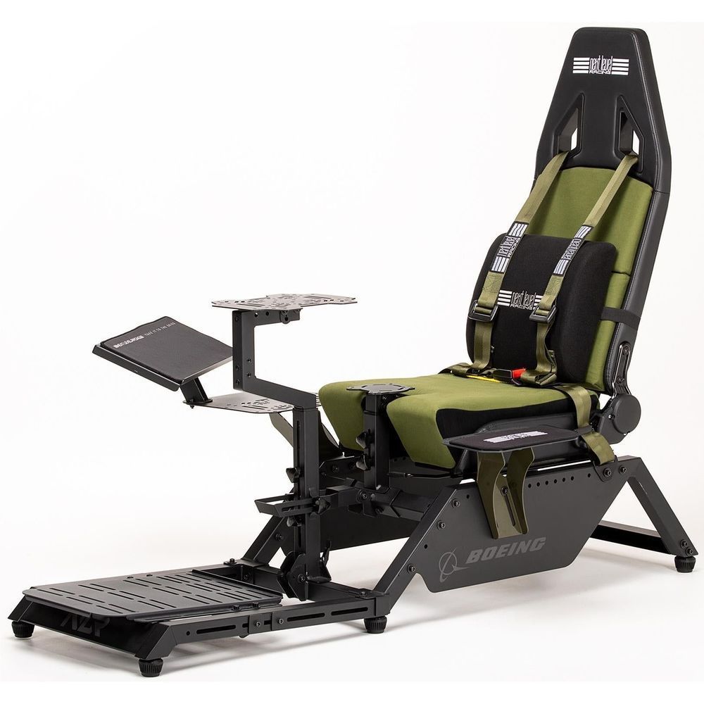 Flight simulator cockpit with olive seat, black arm supports, and two perforated foot platforms