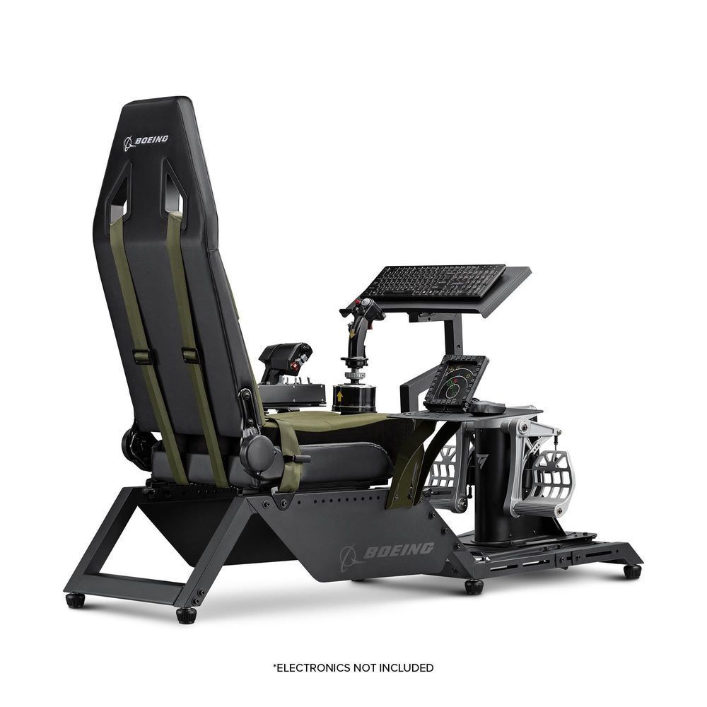 Flight simulator cockpit with black frame, olive seat, and control pedestal with screens
