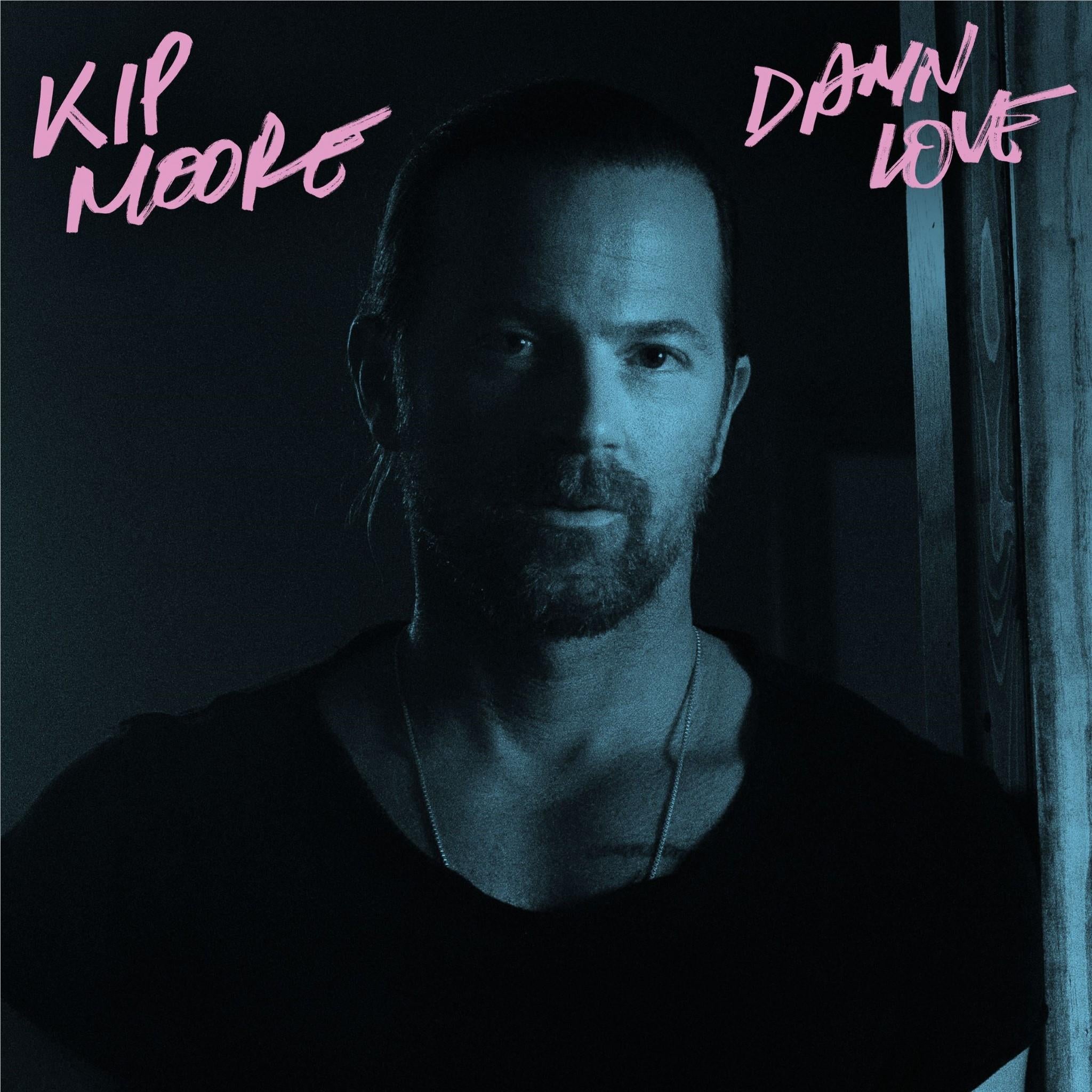 Music album cover with portrait of a man and pink handwritten-style typography
