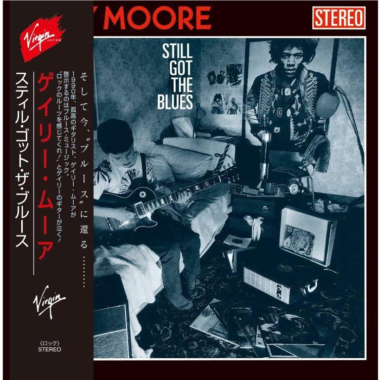 Gary Moore album cover for 'Still Got the Blues' with guitarist, black-and-white photo