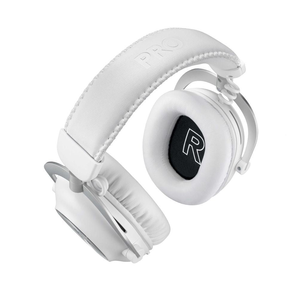 White wireless gaming headset side view with cushioned earcups and boom mic