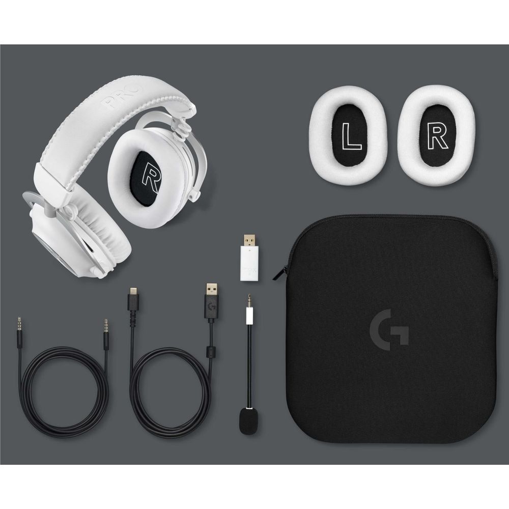 White gaming headset kit with black carrying pouch and multiple cables