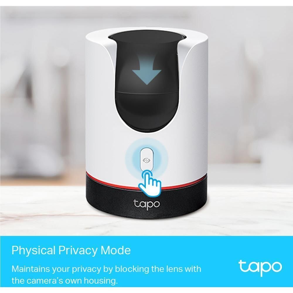 White indoor Wi‑Fi security camera with privacy mode shutter over the lens