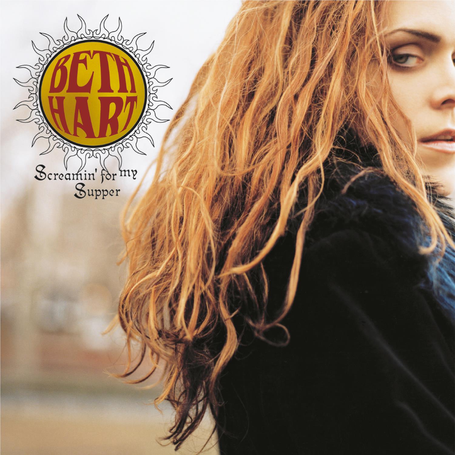 Beth Hart album cover with blonde woman portrait and black jacket