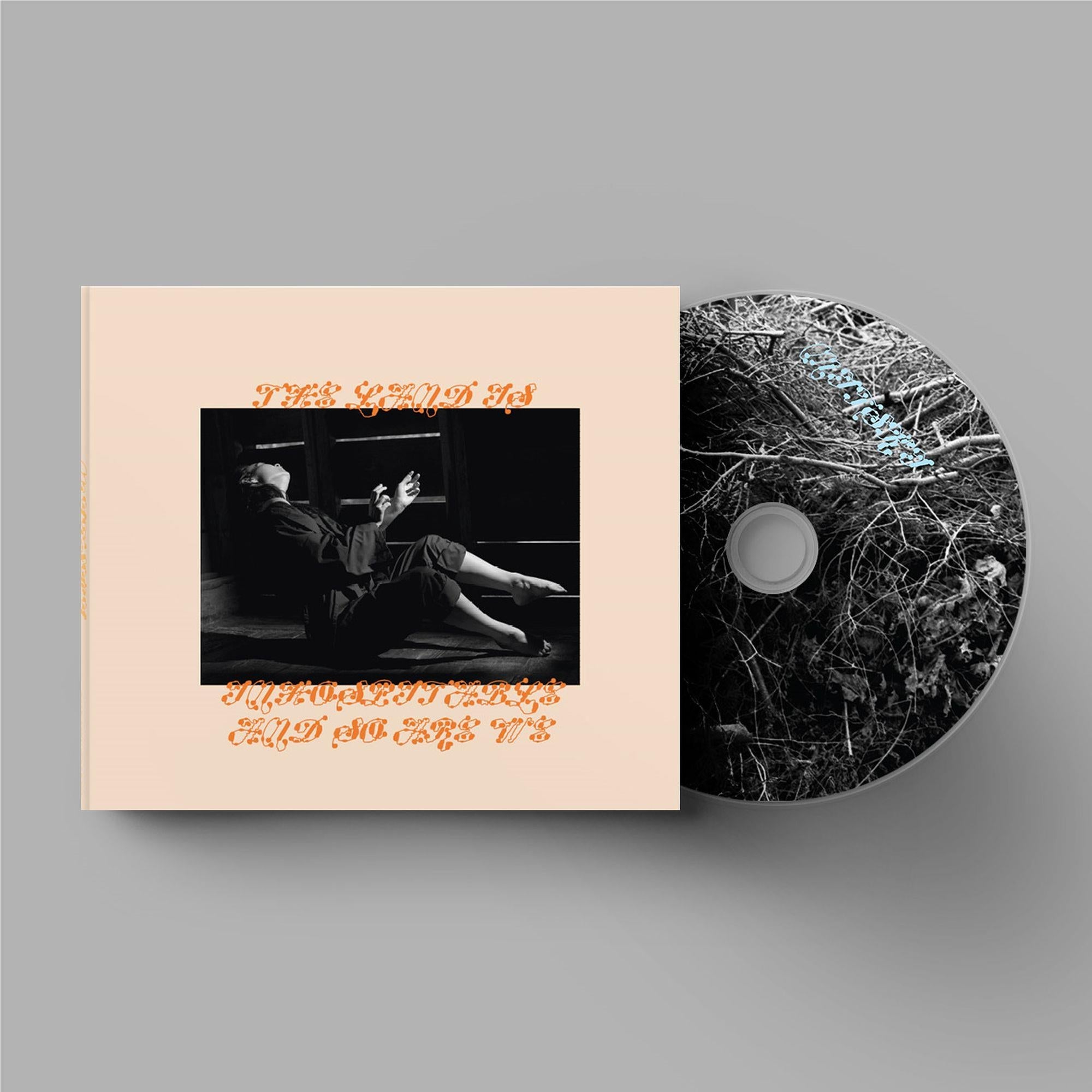 Mitski album CD with cream cover featuring black photo and orange lettering