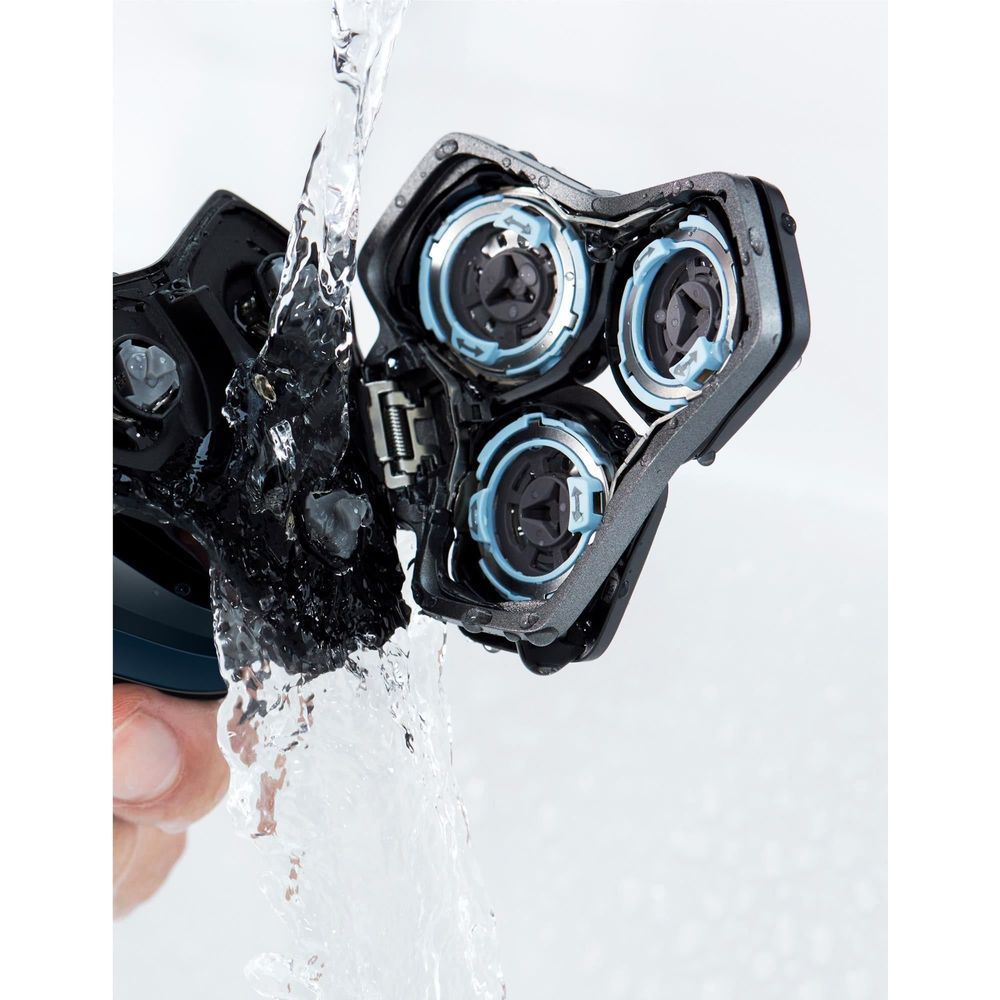 Electric shaver heads with water droplets, three foil cutters exposed