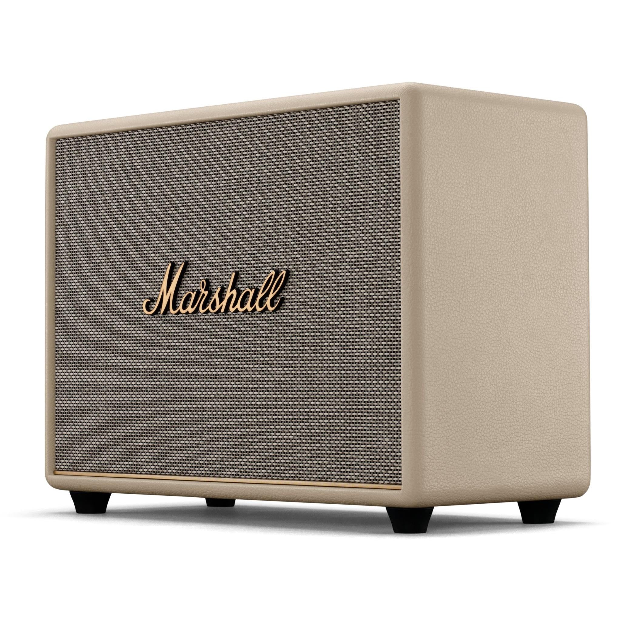 Cream Bluetooth speaker side view with fabric grille and Marshall logo