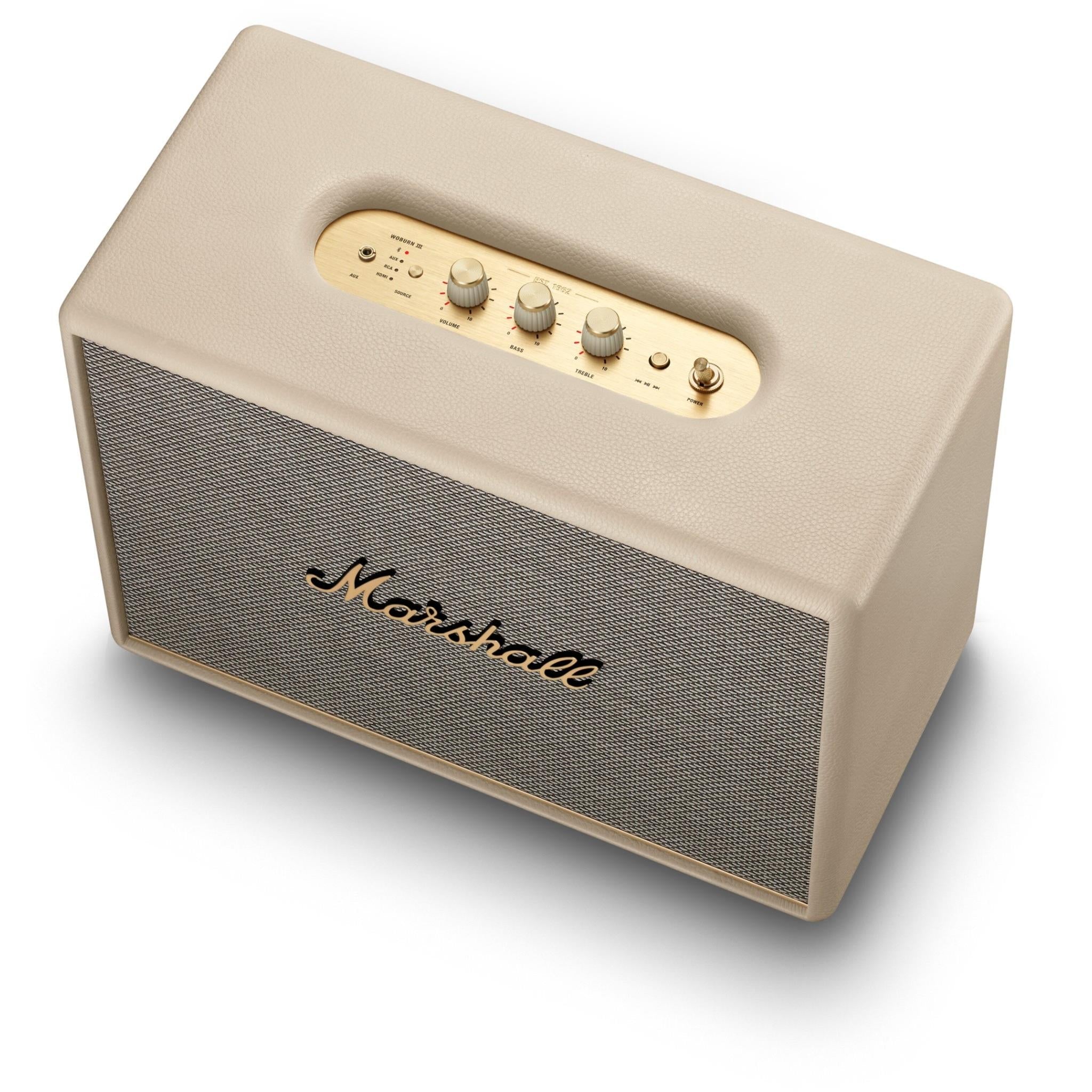 Cream Bluetooth speaker with top control panel and Marshall logo