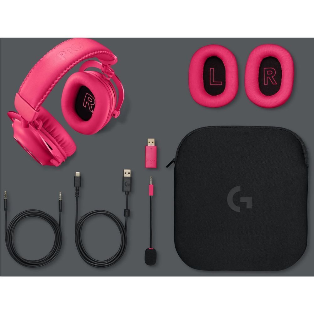 Magenta wireless gaming headset with accessories: cables and black carrying case